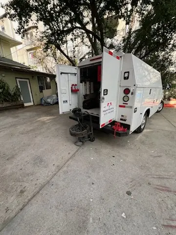 Magnet Plumbing service vehicle on-site for Grease Trap Cleaning in Mansion Park